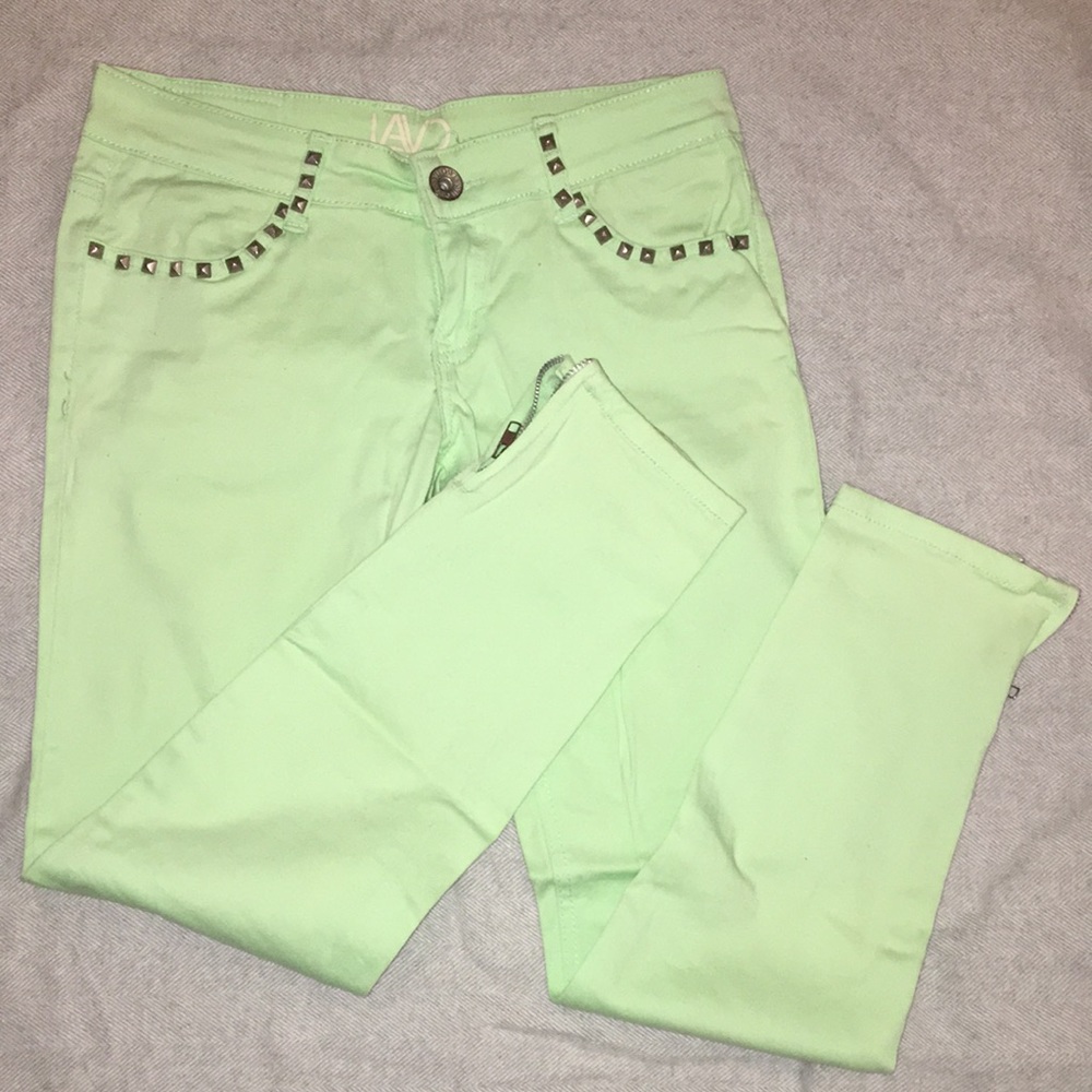 Mint green junior sized 3/4 skinny jeans with stud detailing and zip up ankles